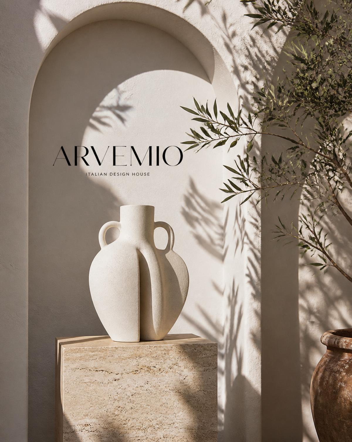 A sculptural handcrafted ceramic vessel on a travertine plinth inside a whitewashed Mediterranean arched niche